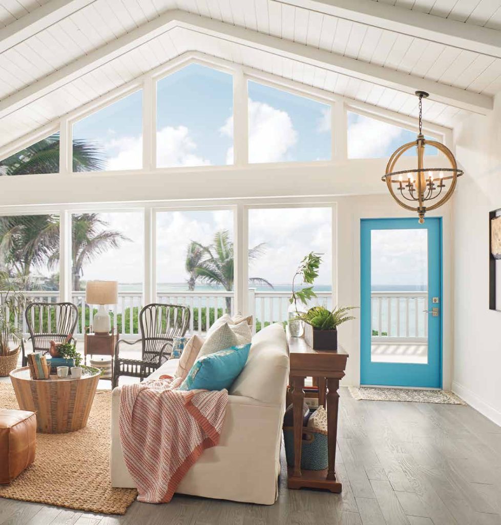A beachside home outfitted with hurricane impact windows and doors.